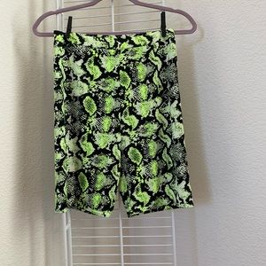 Neon yellow and black snake print bike shorts